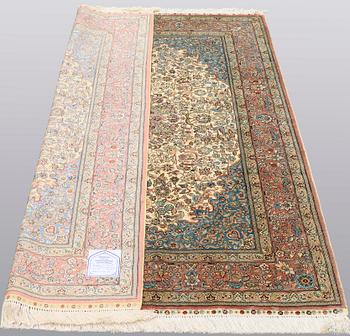 A rug, Figural Oriental silk,  signed, ca 175 x 125 cm.