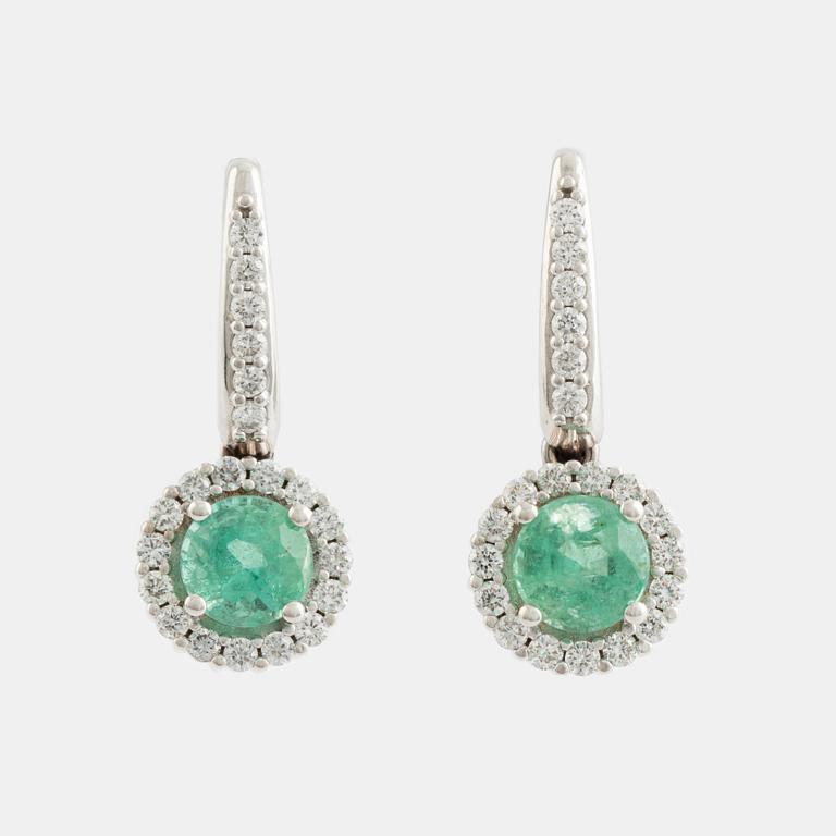 Emerald and brilliant cut diamond earrings.