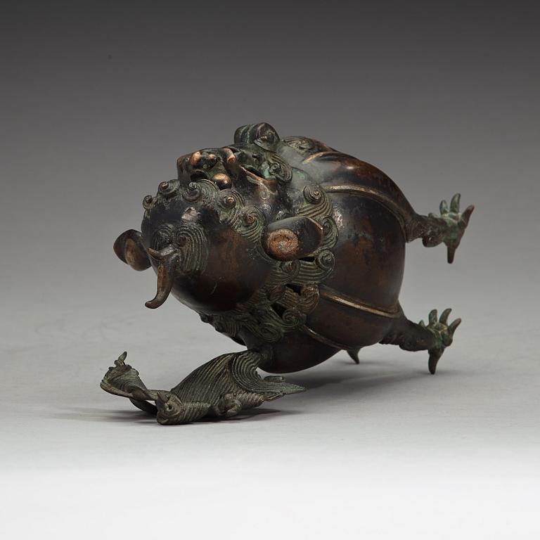 A bronze censer in the shape of a buddhist lion, Qing dynasty (1644-1912).