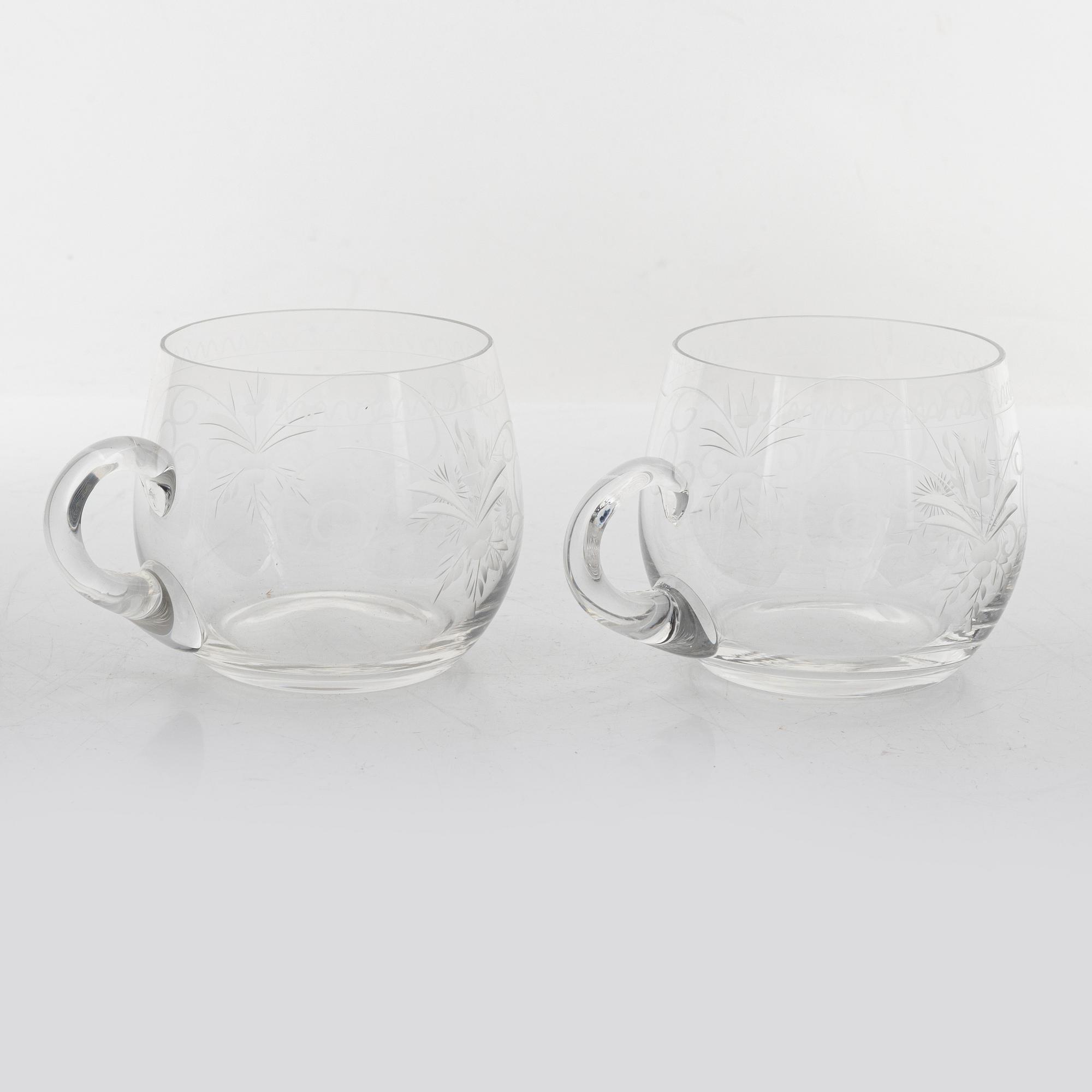 A punch bowl and mugs, glass, mid 20th century.