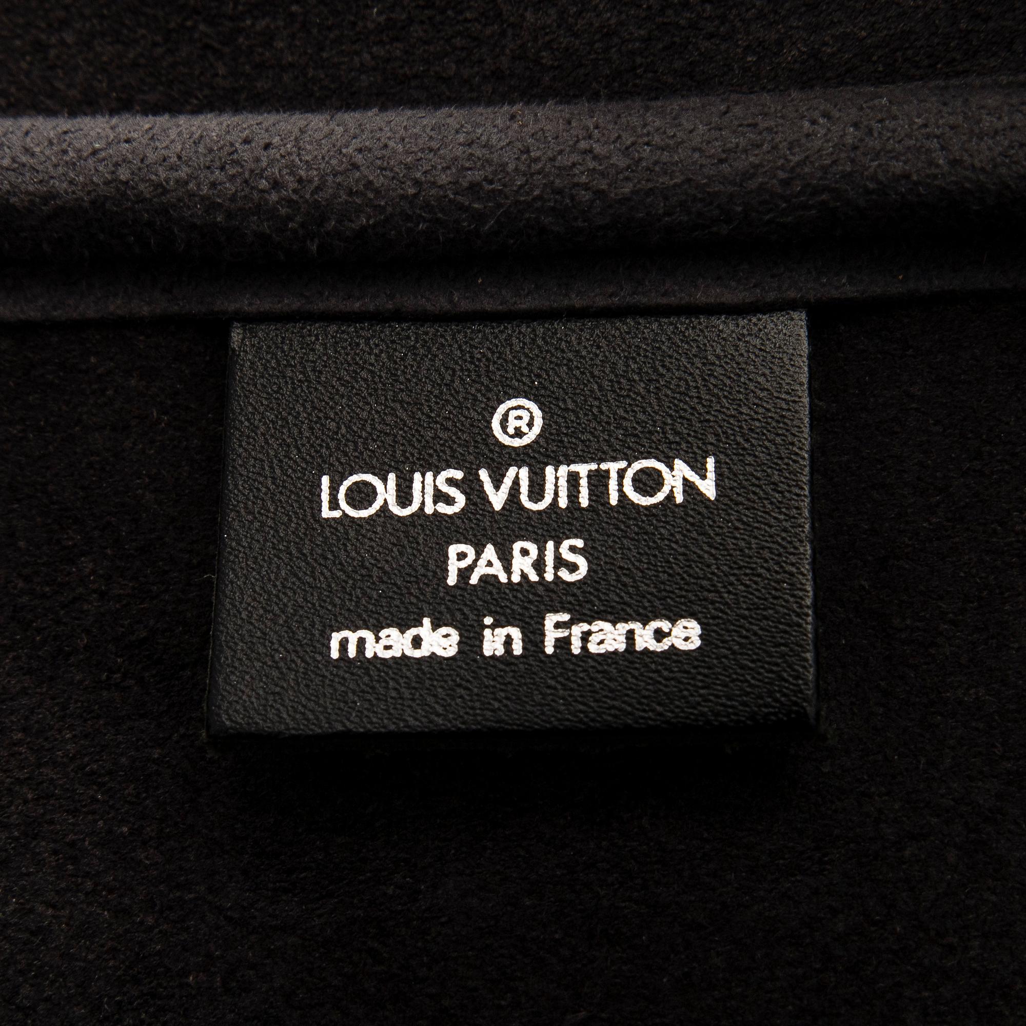 Louis Vuitton, a 'Taiga Kendall PM' weekend bag.