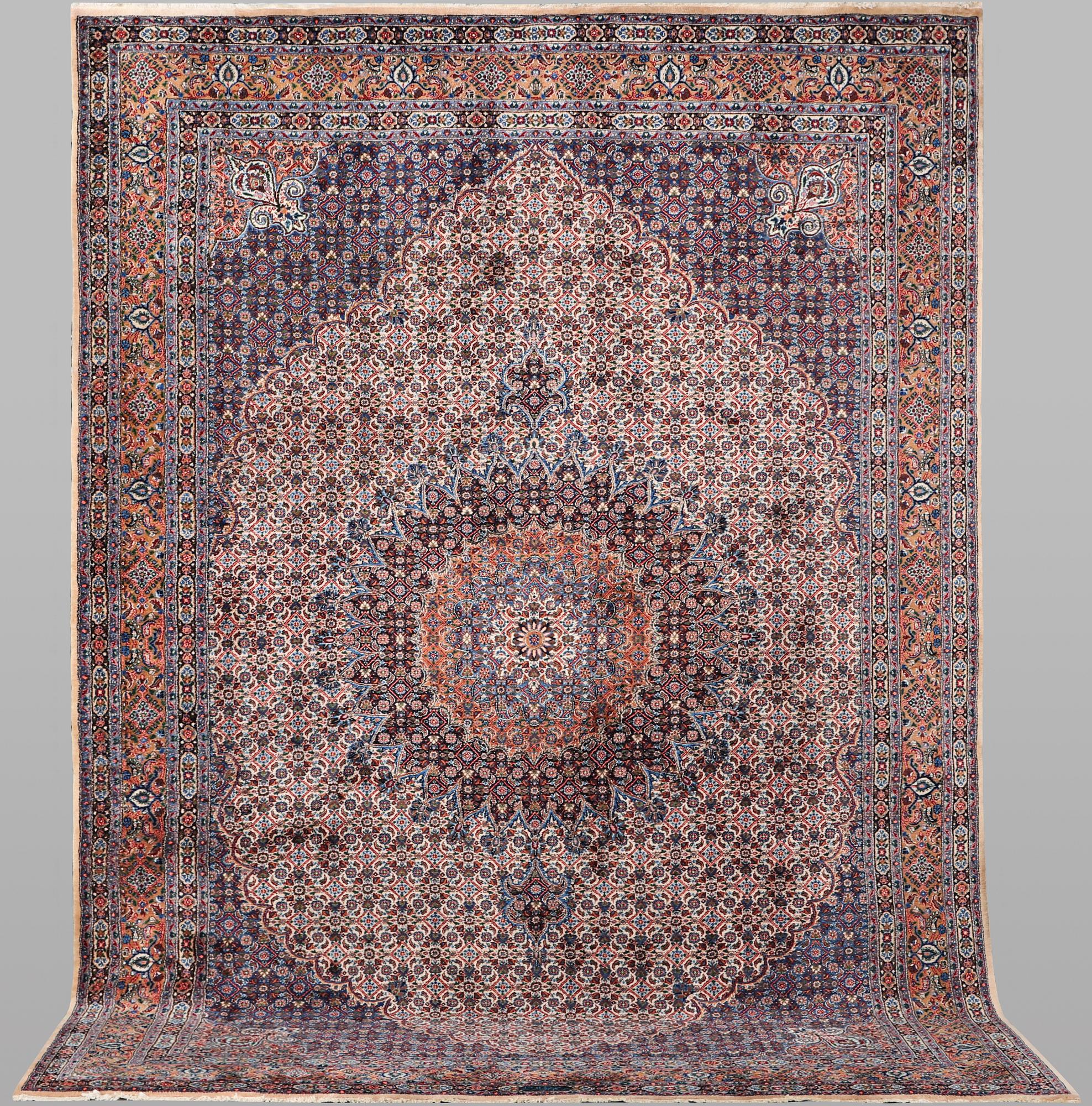A carpet, Moud, signed, ca 385 x 268 cm.