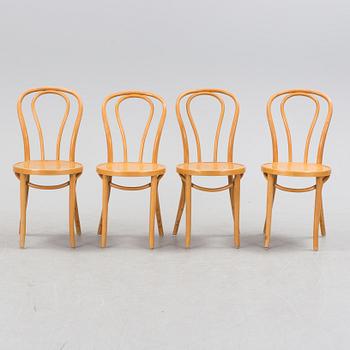 A set of four "Öglan" chairs by IKEA.