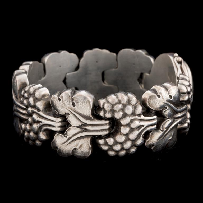 A silver bracelet by Georg Jensen, designed in the 1920's with stamp for after 1945.