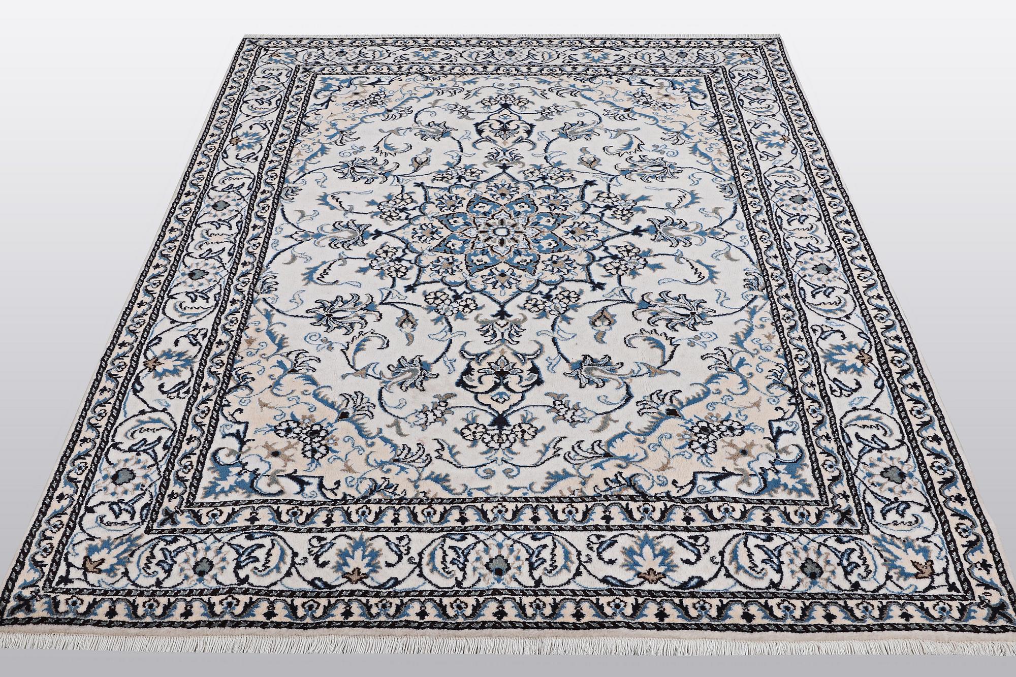 A rug, Nain, part silk, so called 9 LAA, ca 233 x 164 cm.