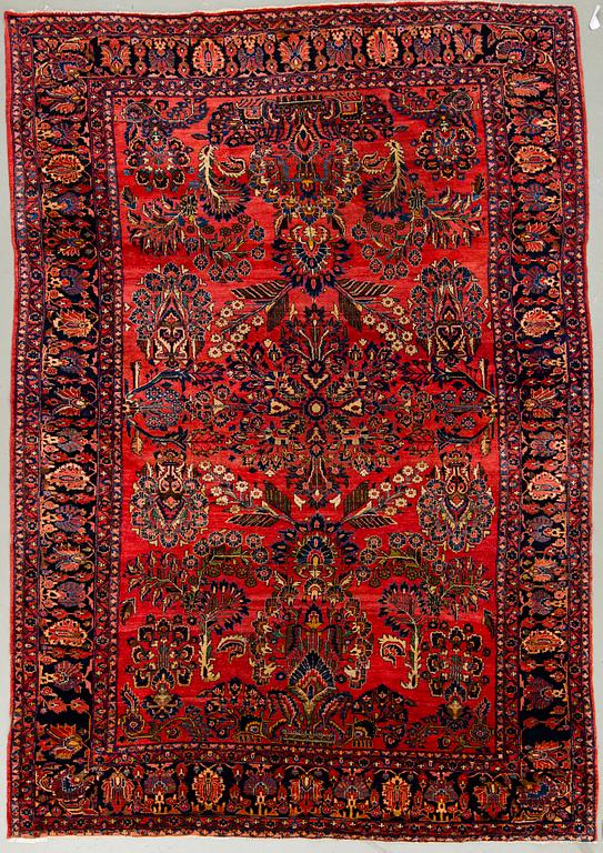 A semi-antique Sarouk, aroud 330 x 224 cm.