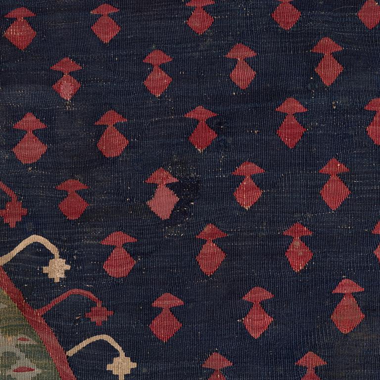 An antique Sarköy kelim, ca 239 x 214 cm.