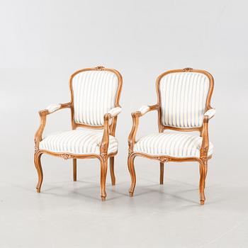 A pair of mid 20th century armchairs.