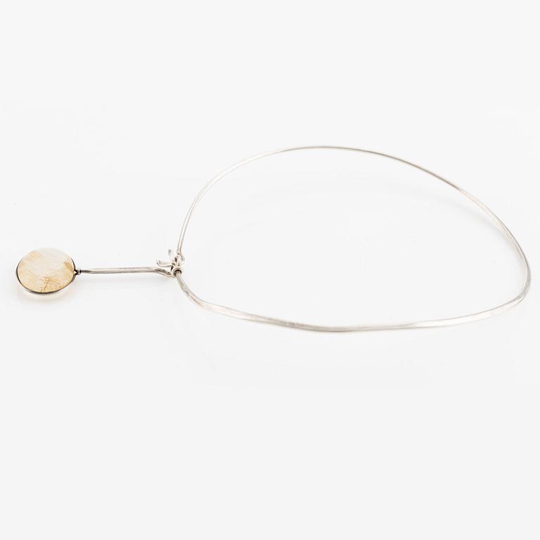 Vivianna Torun Bülow-Hübe, a necklace, silver, with a rutilated quartz pendant. Georg Jensen.