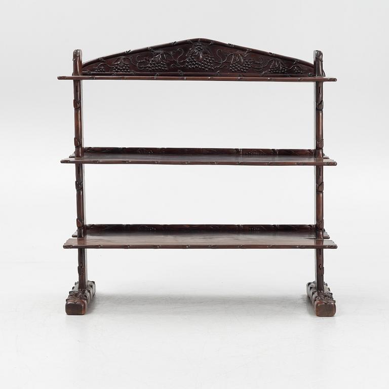 A Chinese hardwood shelf, 20th century.