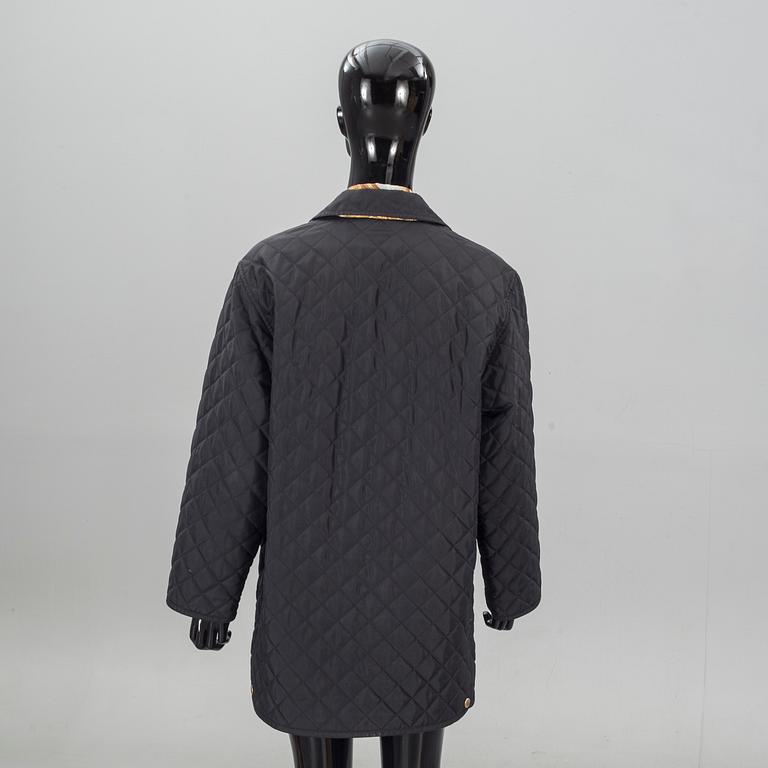 JACKA samt BLUS. Salvatore Ferragamo.