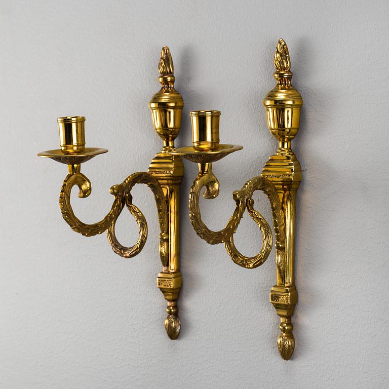 A pair of brass 'Törne' wall sconce, Ikeas 18th century Swedish Furniture series.