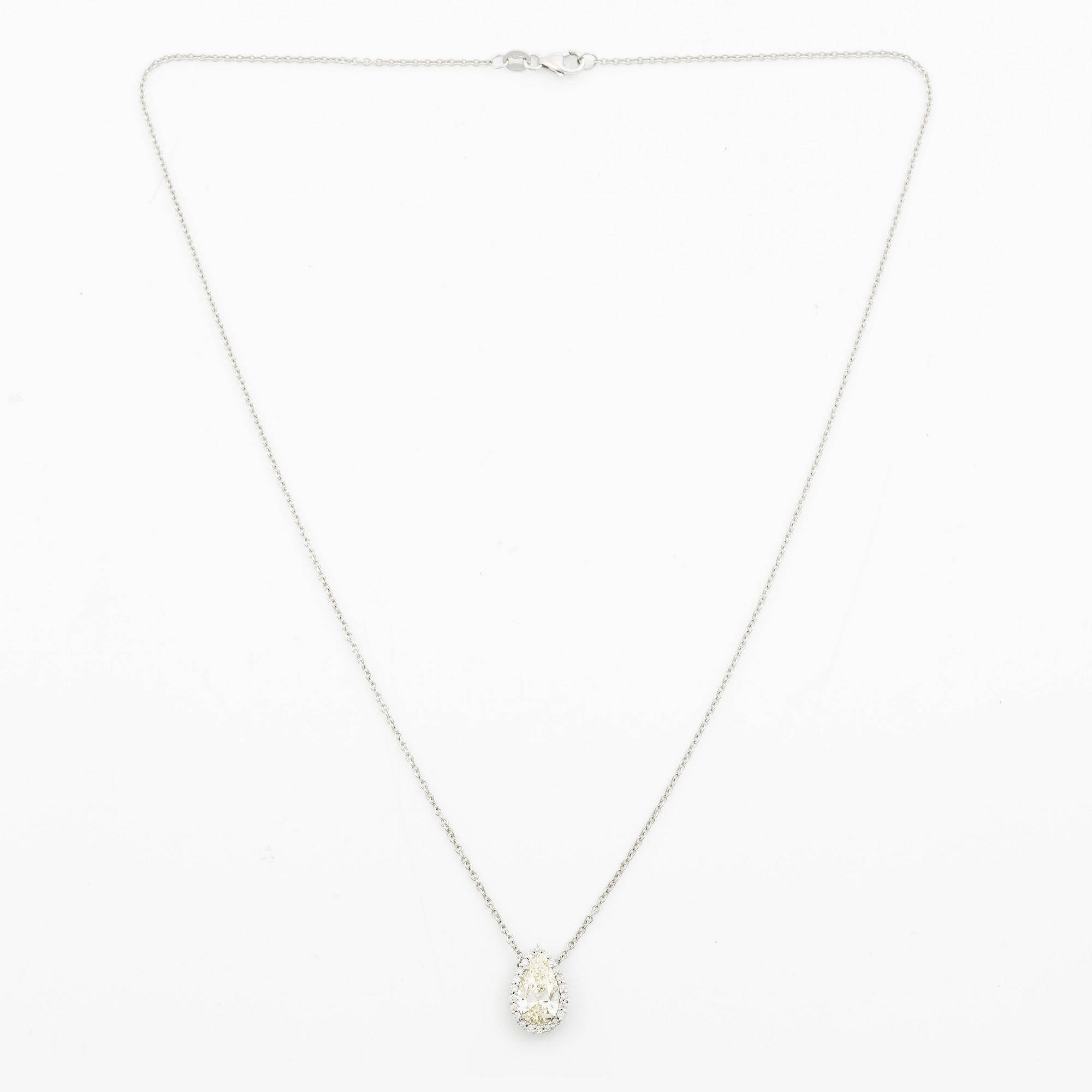 Collier 18K vitguld med droppslipad diamant, medföljande GIA report.