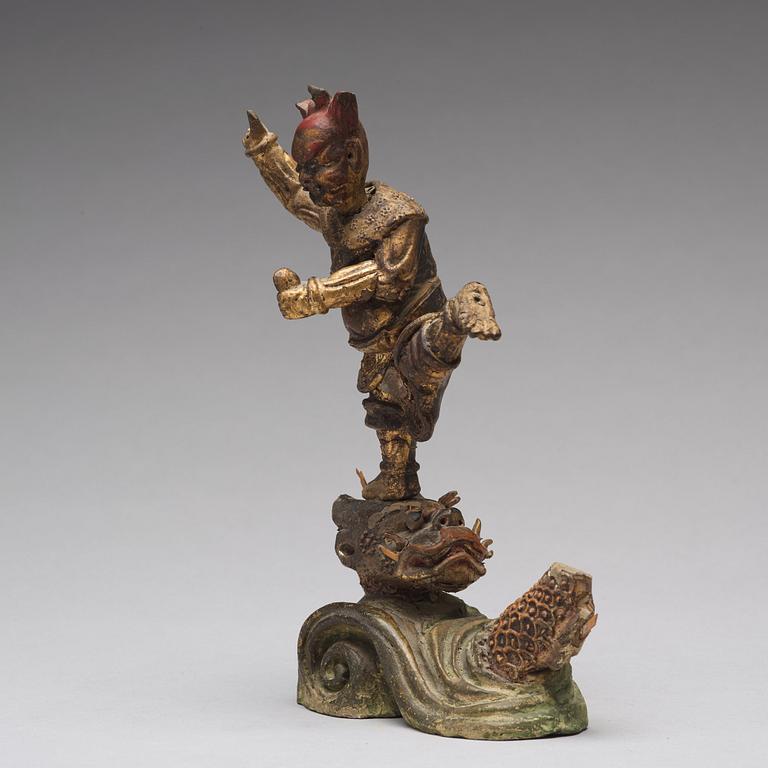 A gilt lacquer sculpture of deity, Qing dynasty, 18th Century.