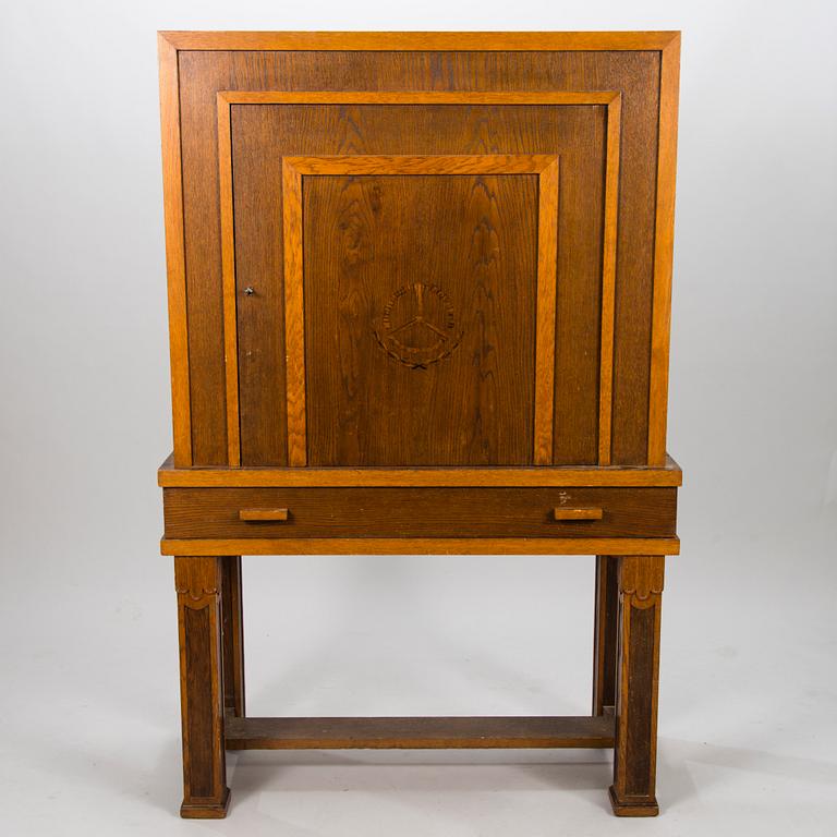 A 1920's oak cabinet.