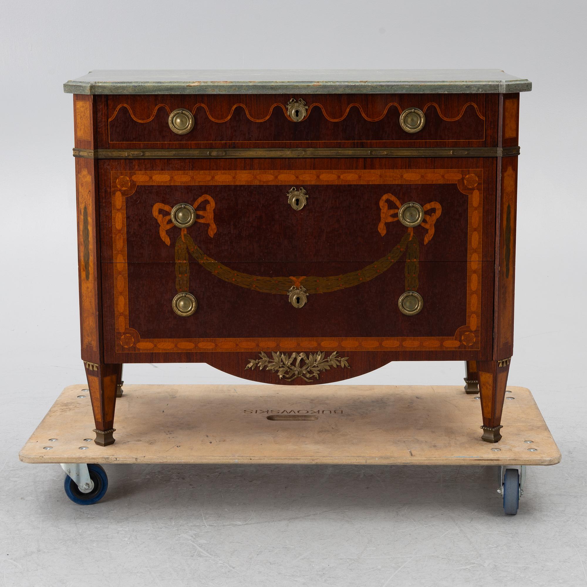 A Gustavian style chest of drawers, 20th century.