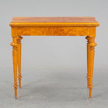 An early 20th Century birch card table.