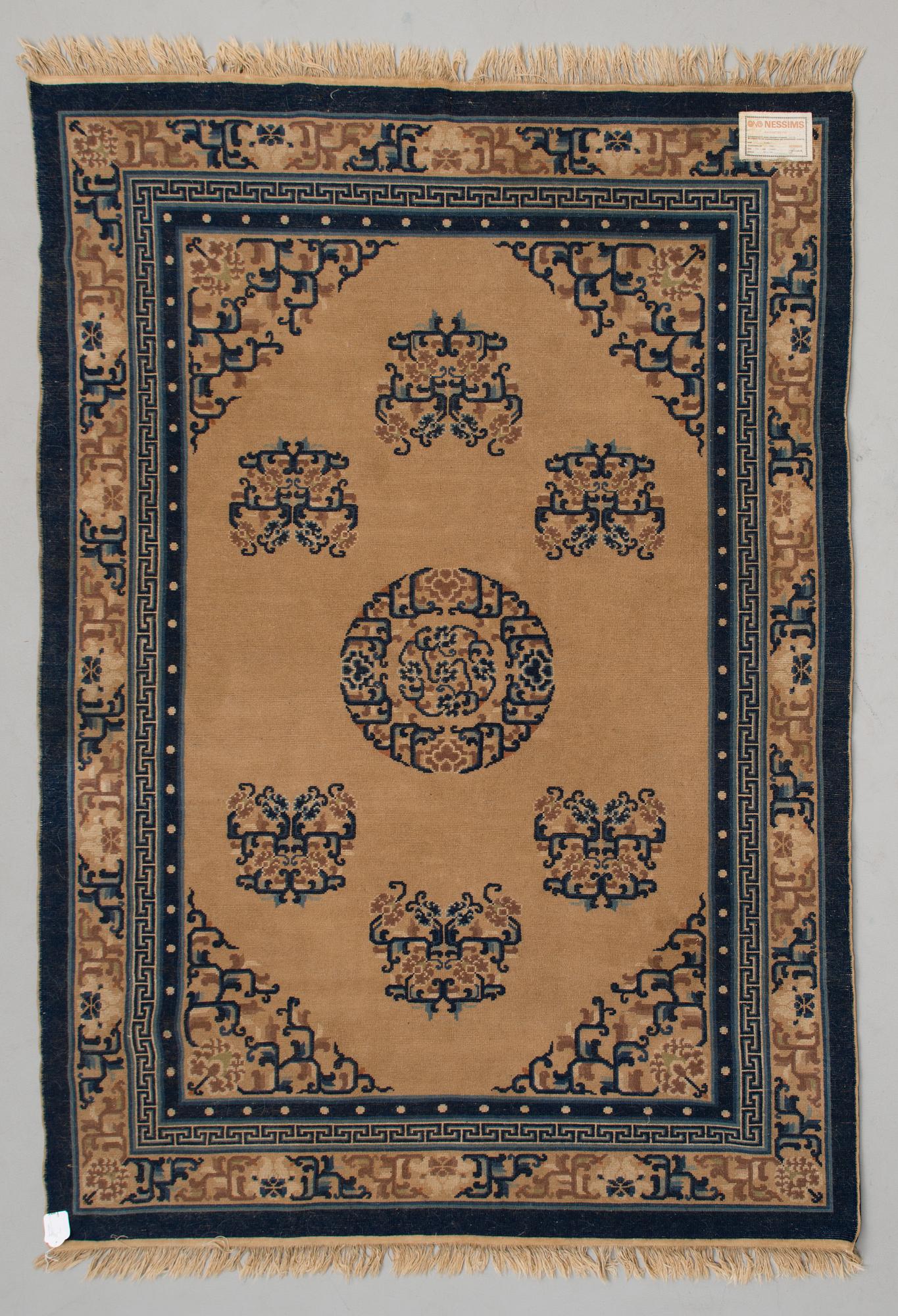A Chinese carpet, ca 244 x 168 cm.