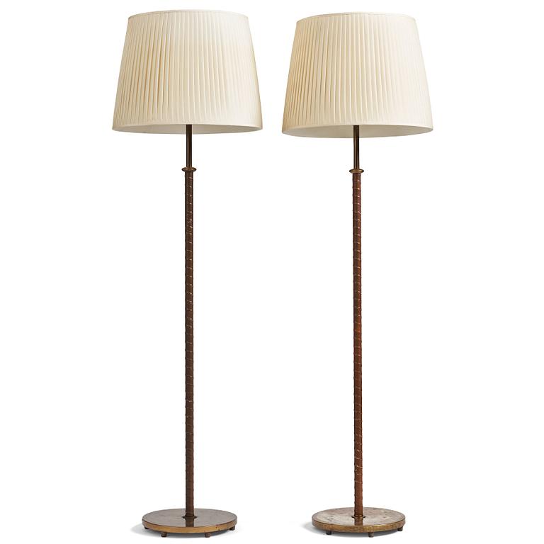 Harald Notini, a pair of floor lamps, model "15242", by Böhlmarks, Sweden 1940-50s.