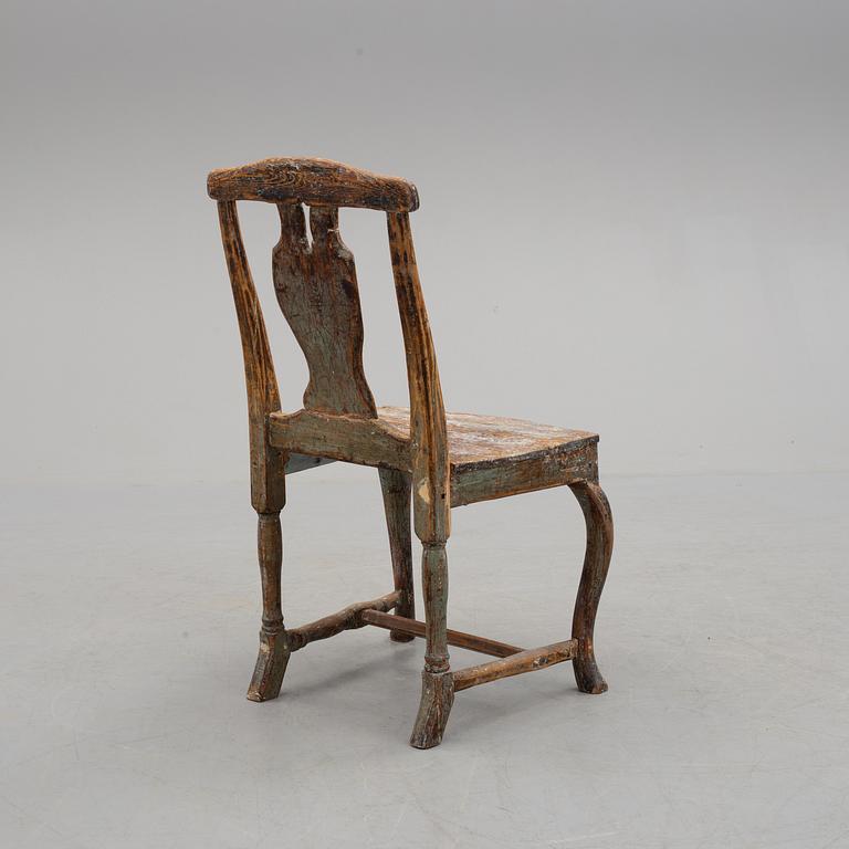 a 18th century wooden chair.