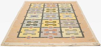 Agda Österberg, a carpet, flat weave, ca 304,5 x 199,5 cm, an embroidered signature at the back.