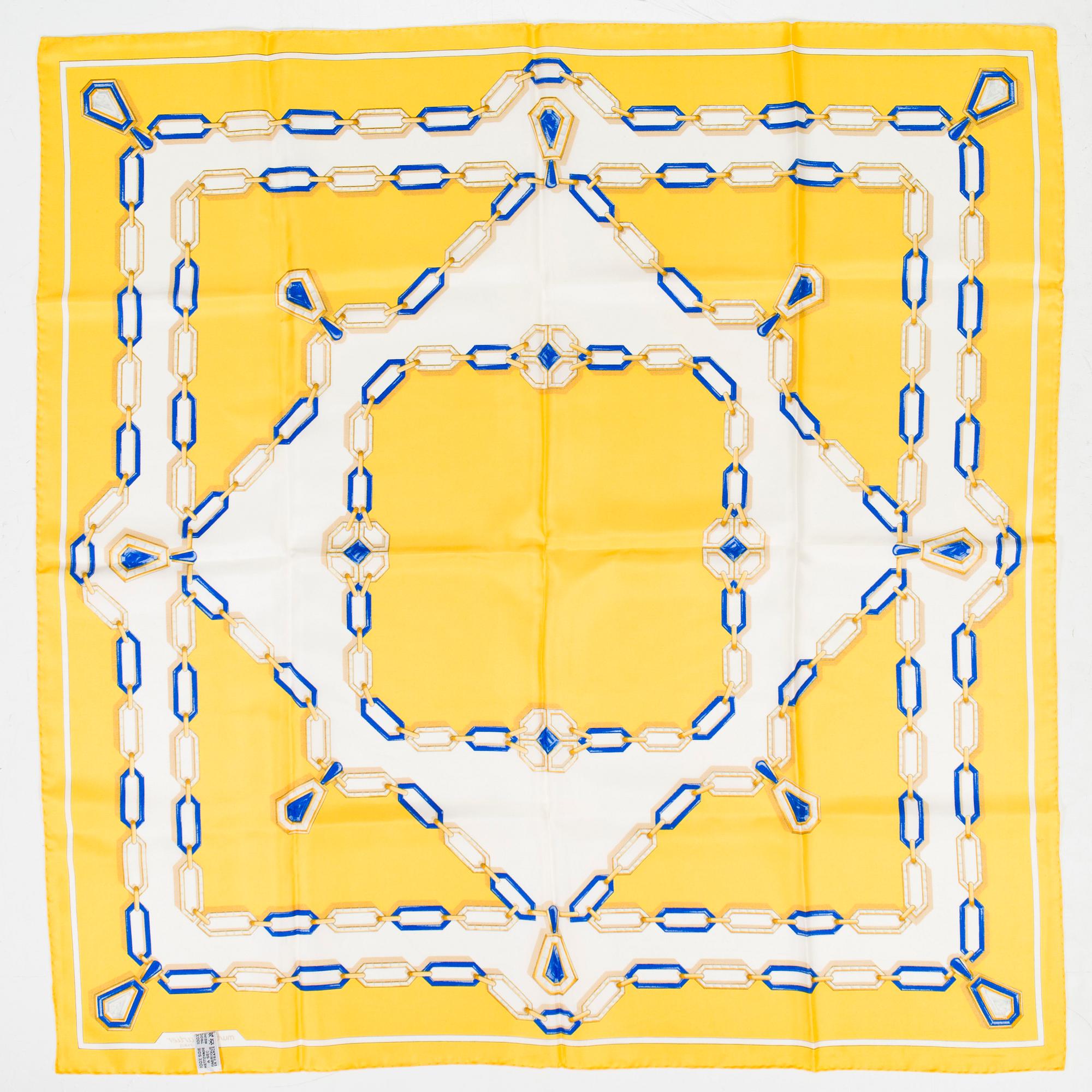 must de Cartier, a silk scarf.