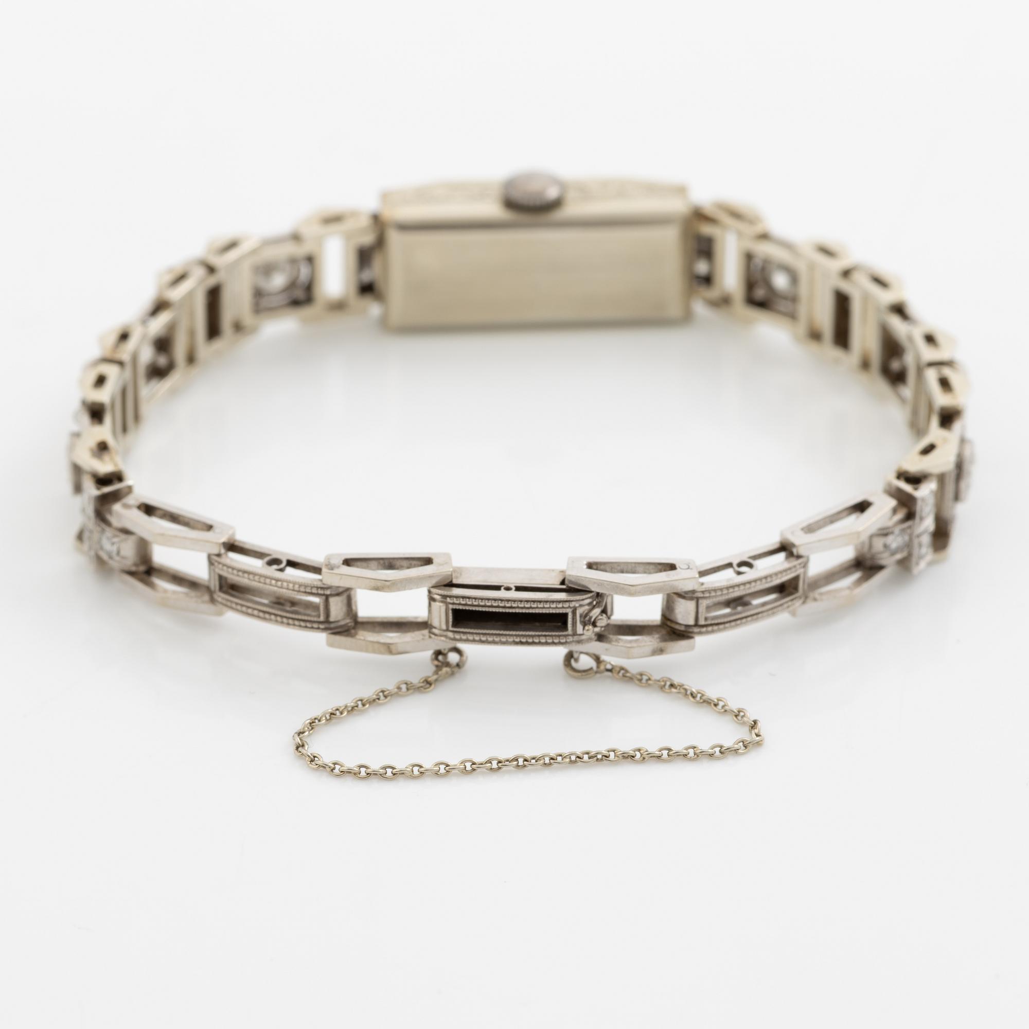 Armbandsur, art déco, länk 18K vitguld med briljantslipade och gammalslipade diamanter, K& KC Göteborg 1941.