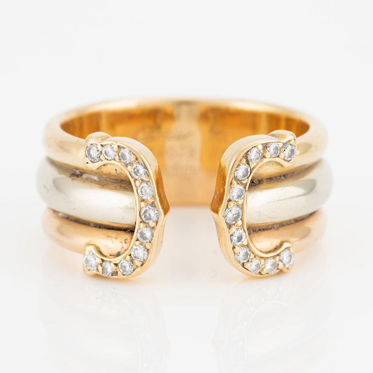 Cartier ring "Double C" 18K trefärgat guld med runda briljantslipade diamanter.