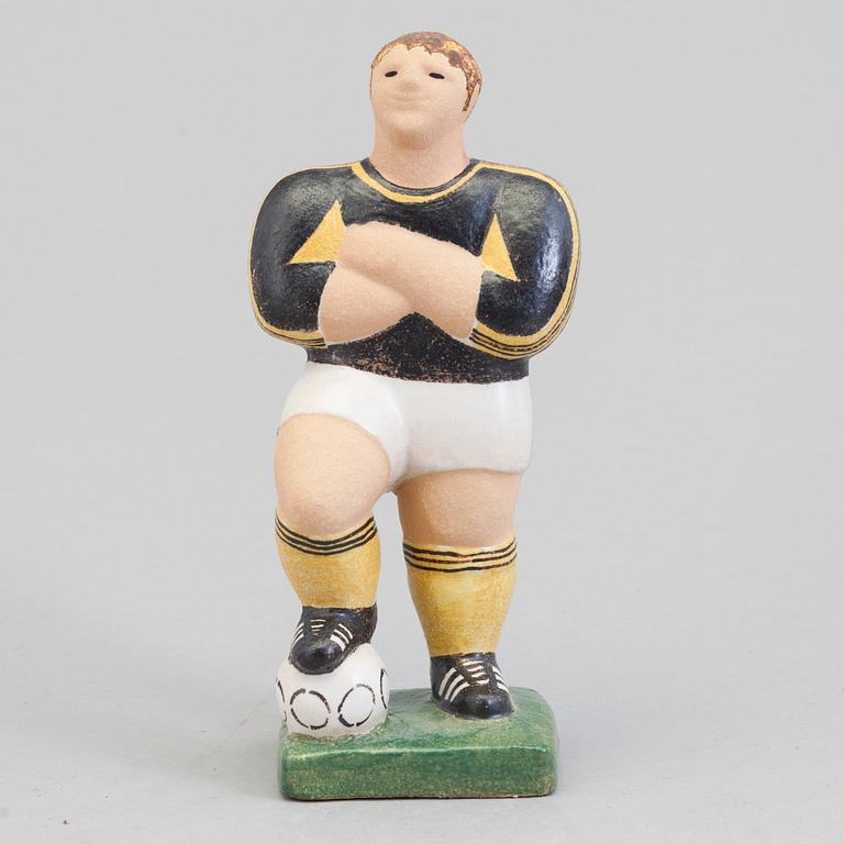 A Lisa Larson figure of a football player, Sweden.