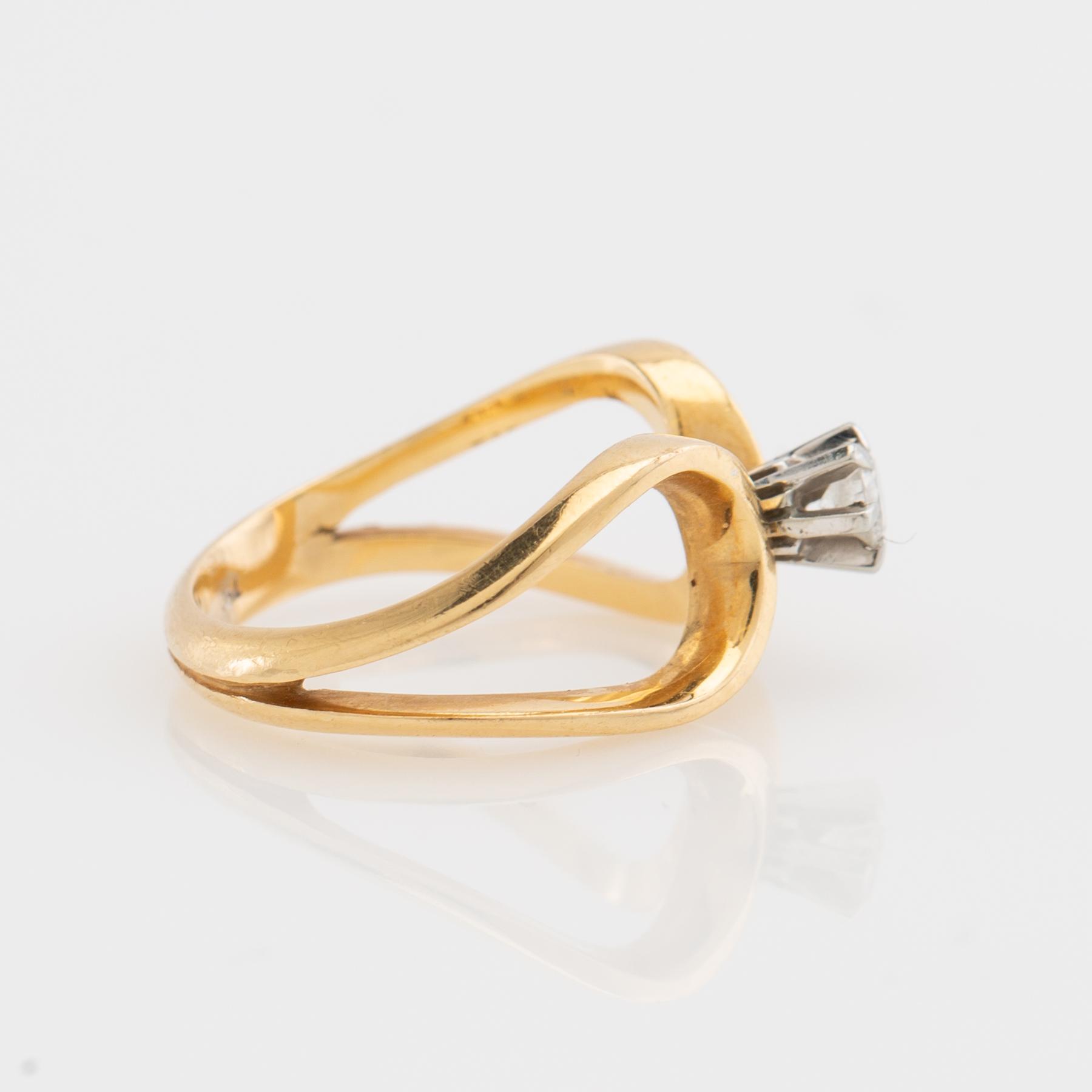 Ring, fantasy model, 18K gold with diamond.