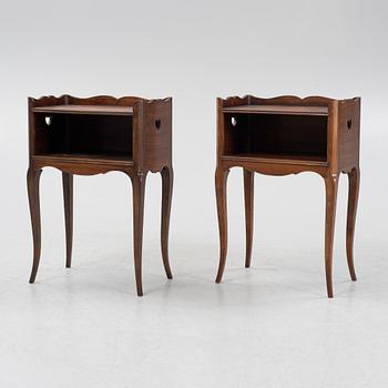 A pair of rococo style bedside tables, mid 20th Century.