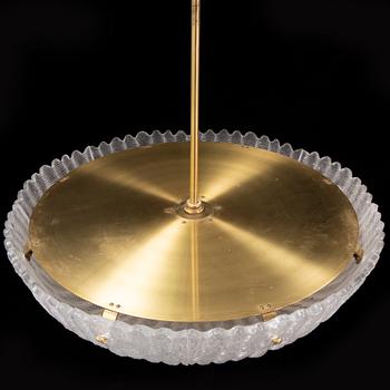 Orrefors, a brass and glass ceiling light, second half of the 20th century.