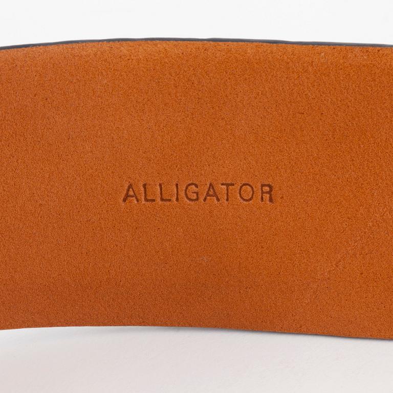 RALP LAUREN, a blue crocodil belt.