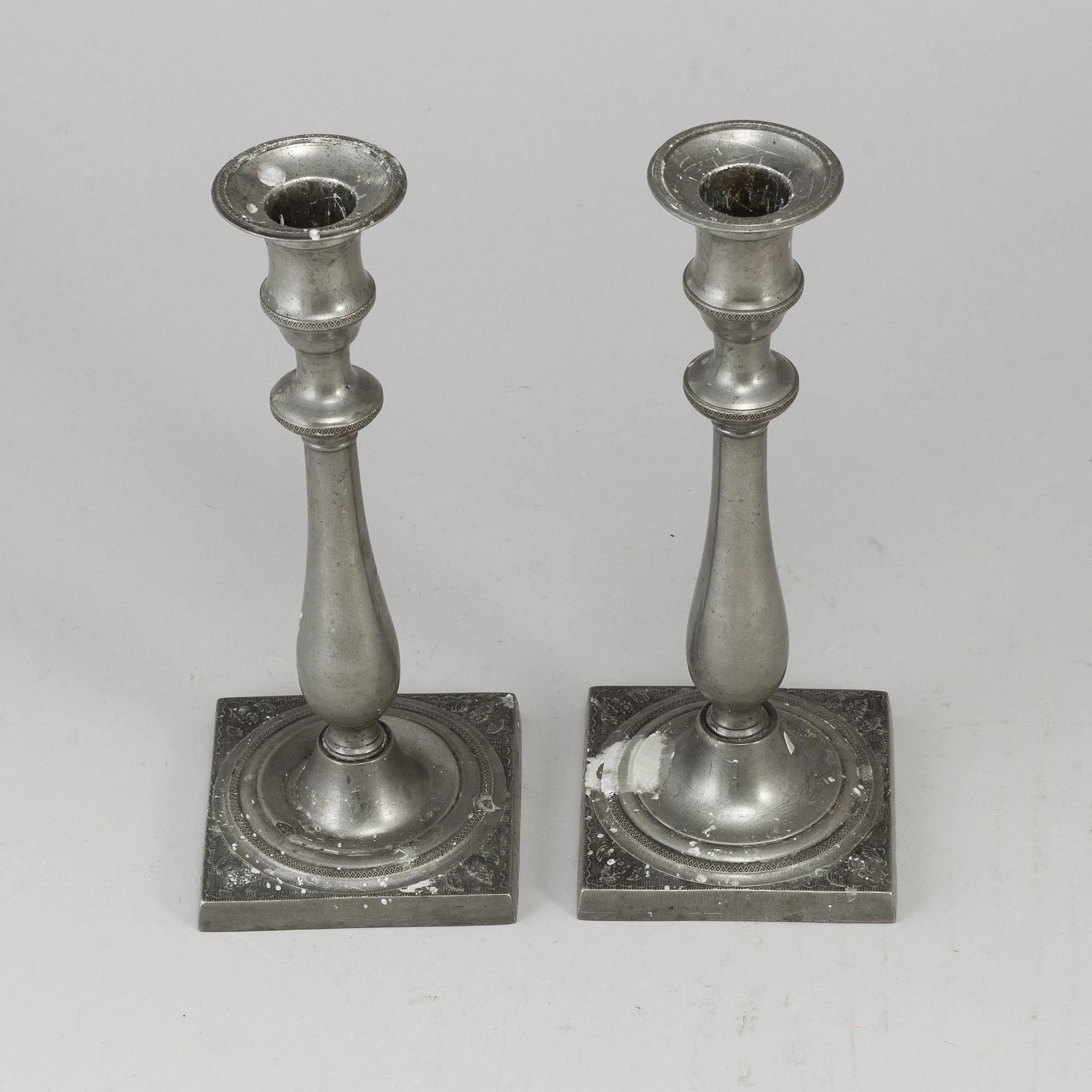 A pair of empire pewter candlesticks, first half of the 19th century.