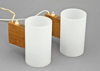 VÄGGLAMPOR, ett par, Uno och Östen Kristiansson, Luxus, 1900-talets andra hälft.