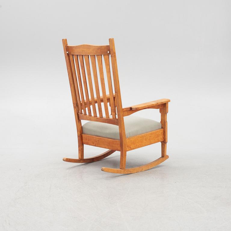 Gustav Stickley, after. A 'Bungalow Rocker' rocking chair, early 20th Century.