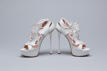 SKOR, Versace.