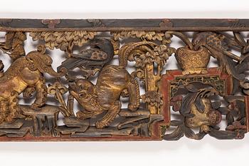 A Chinese carved wood panel, 19th Century.