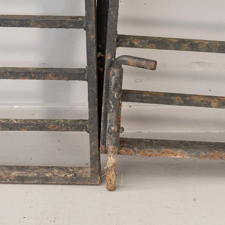 A pair of cast iron gates from the first half of the 20th Century.