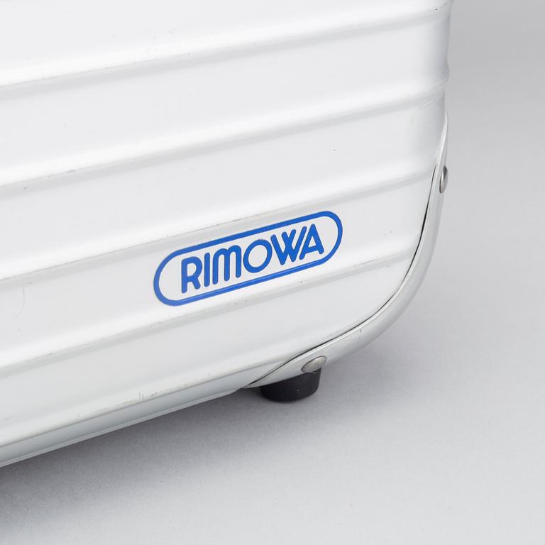 A set of three Rimowa bags later part of the 20th century.