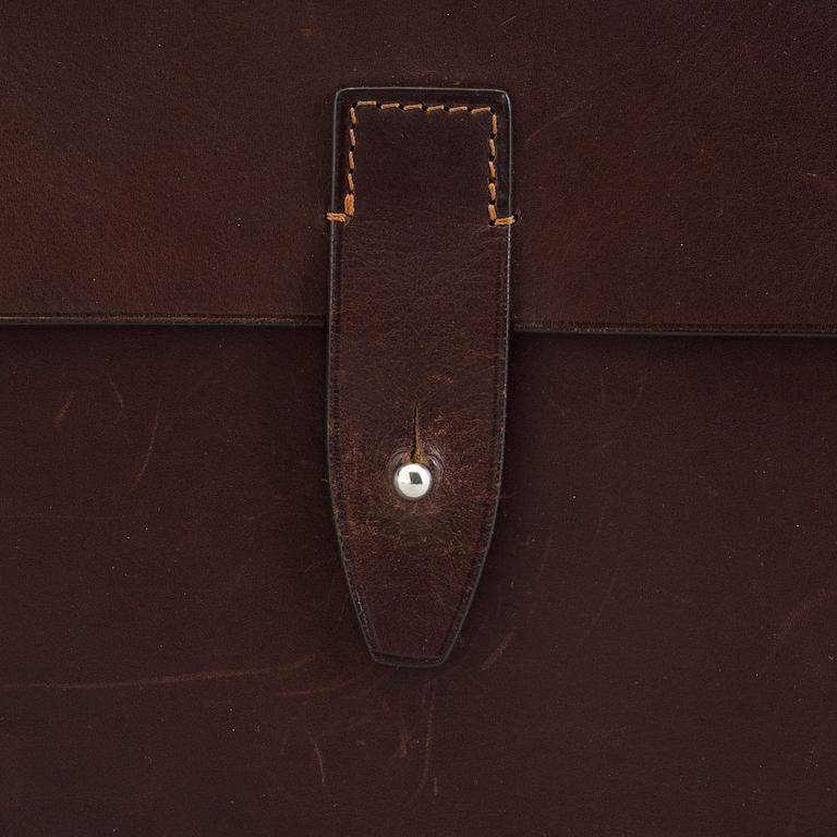 THOMAS SANDELL, a leather bag from Palmgrens.