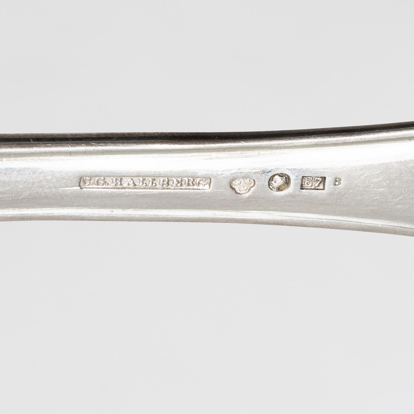 C.G. Hallberg, A 36 piece 'Svensk spets' cutlery service, Stockholm 1907.
