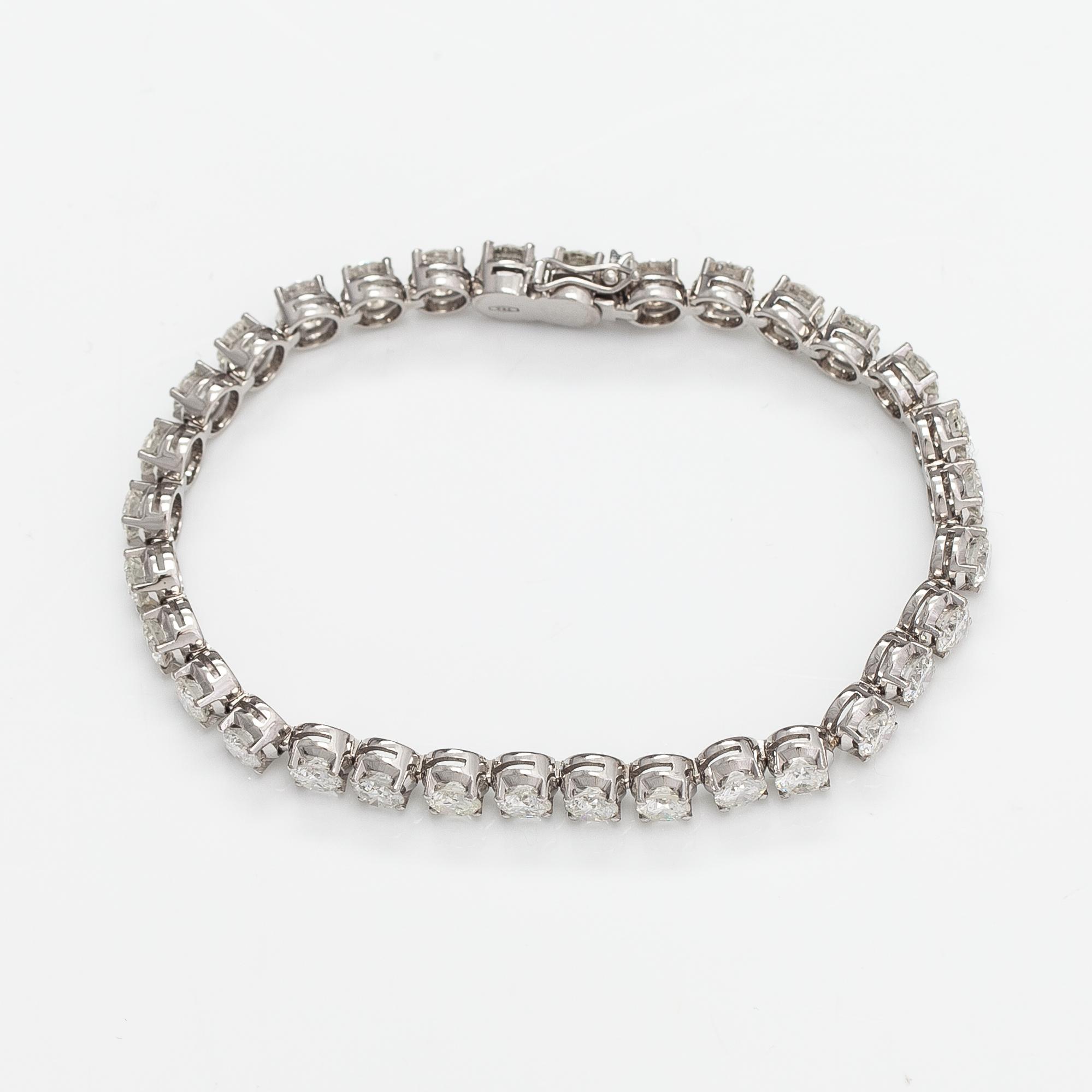 Tennisrannekoru, 18K valkokultaa ja briljanttihiottuja timantteja n. 7.50 ct yht.