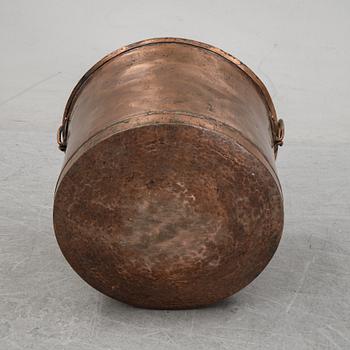 A 19th Century copper pot.