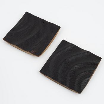 Magnus Ek, a set of eight oak plates for Oaxen Krog.