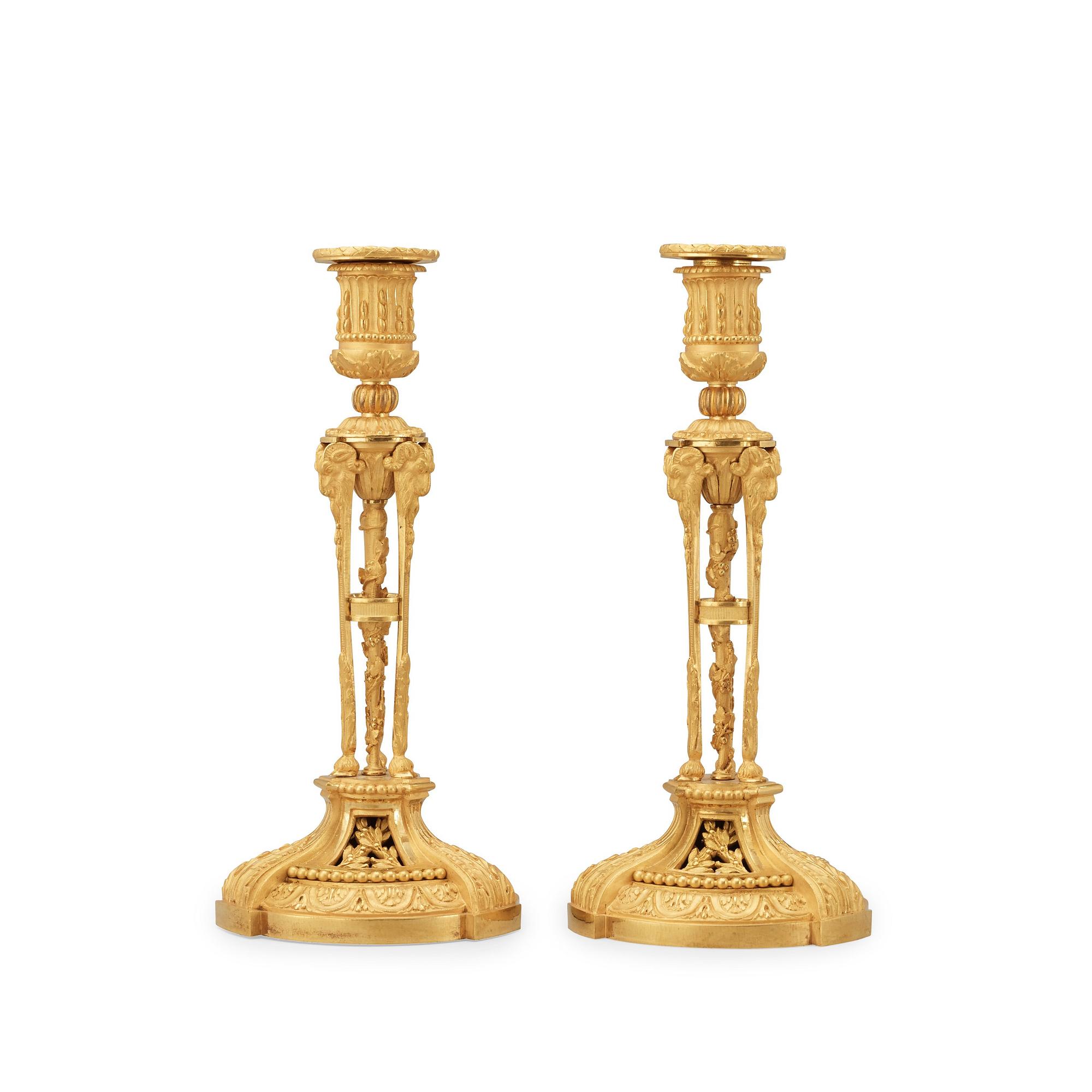 A pair of Louis XVI-style candlesticks, presumably early 20th century.