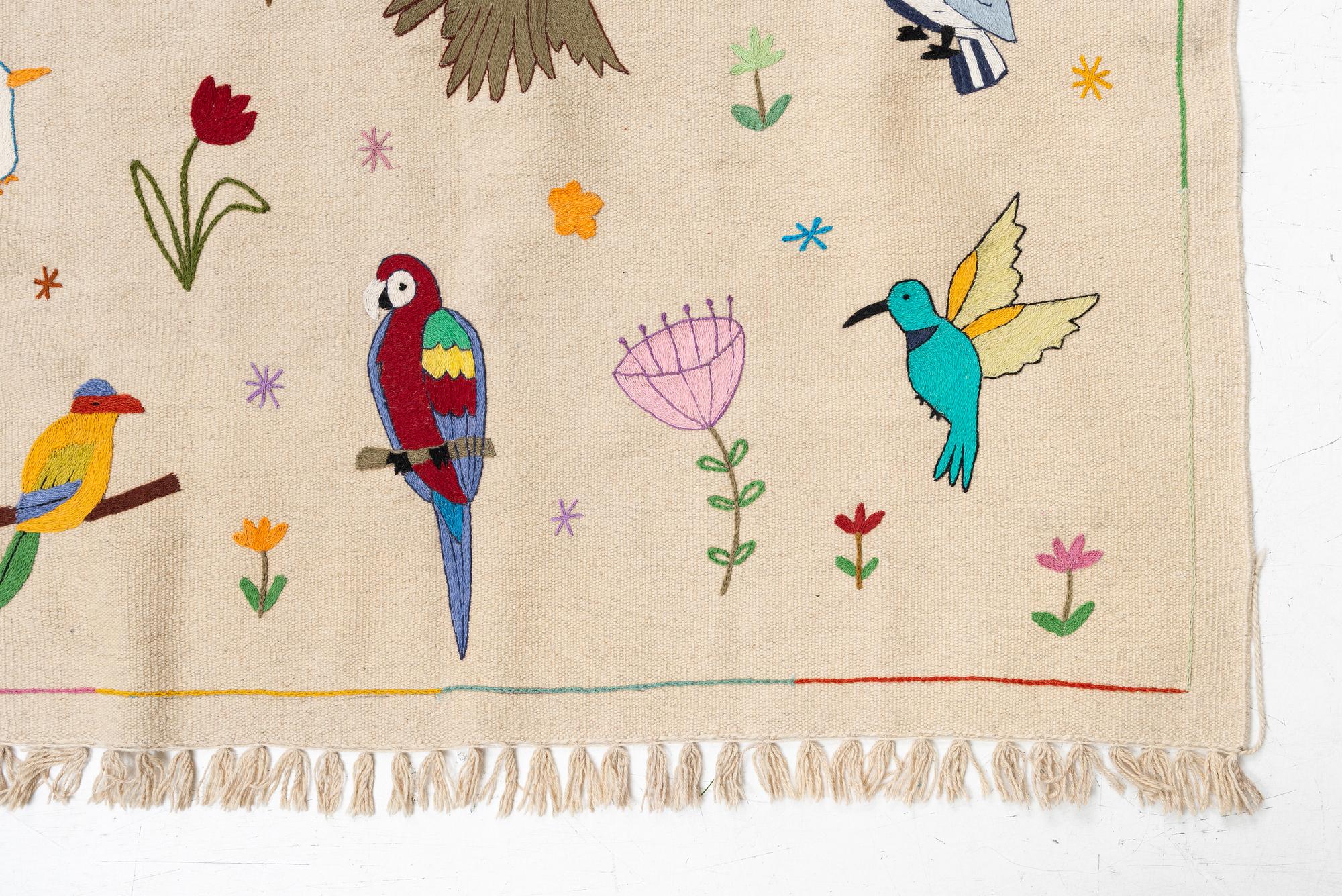 A hand-embroidered Kelim carpet, c. 200 x 145 cm.