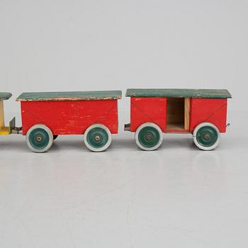 A set of four pieces wooden toy train.