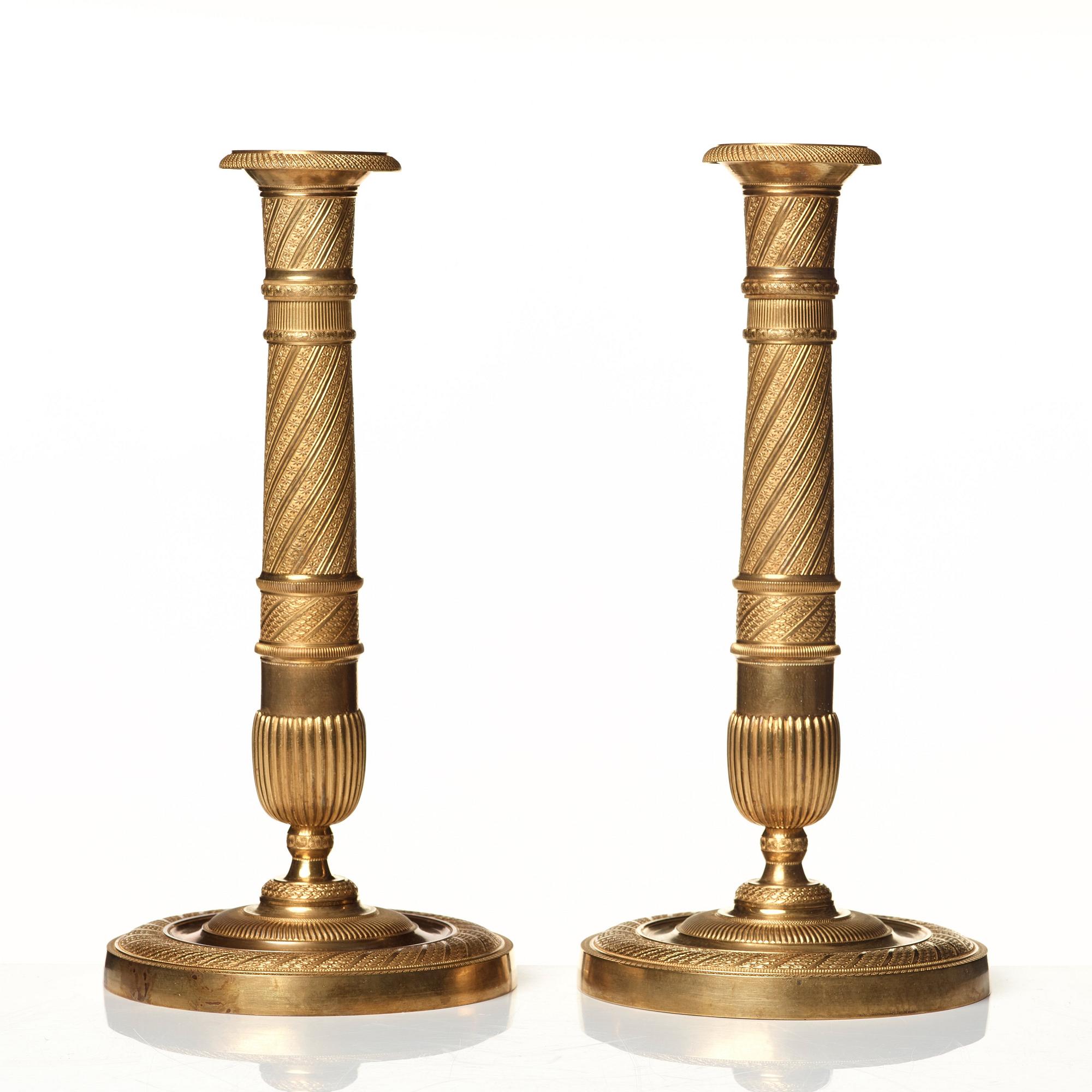 A pair of Empire candlesticks.