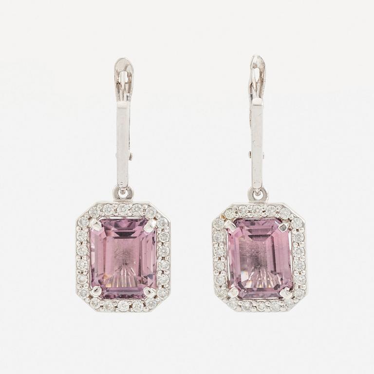 Purple tourmaline and brilliant cut diamond earrings.